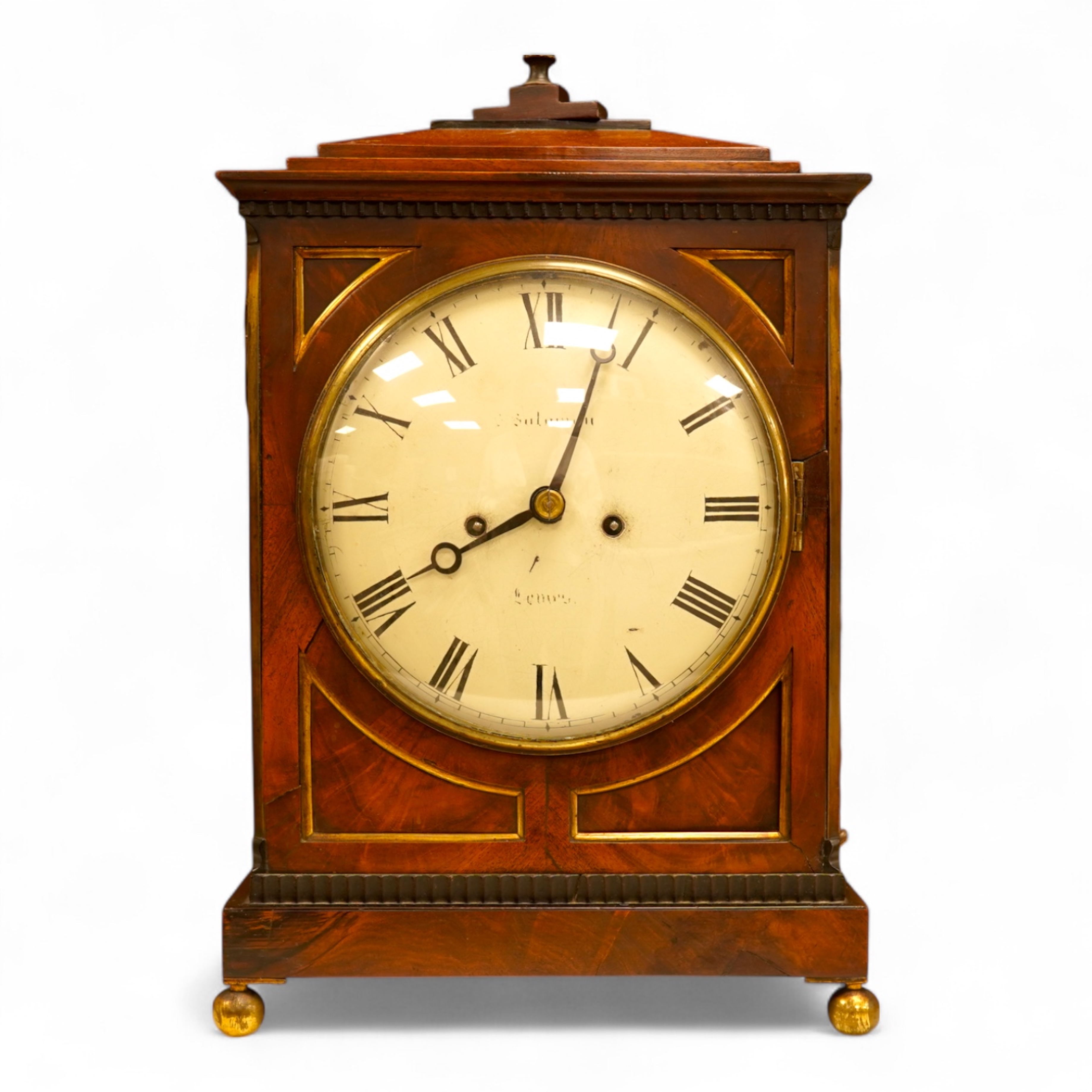 An early 19th century rosewood and brass bracket clock, striking on a bell, with pendulum and key, 47cm high